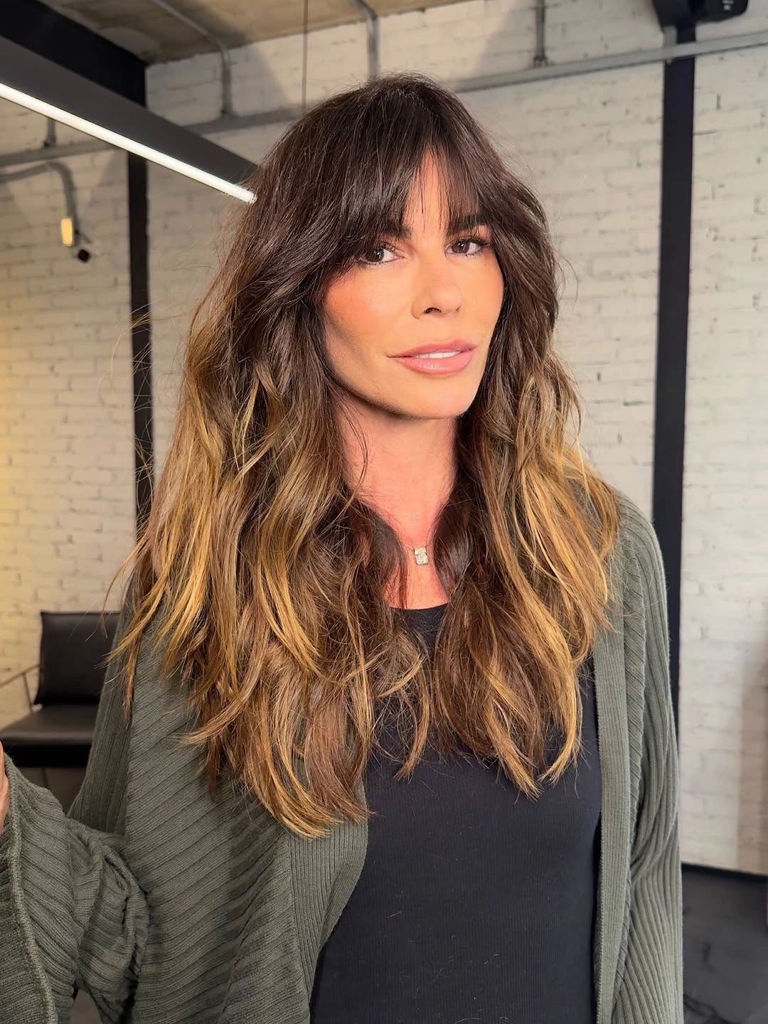 flattering november haircut ideas 2026 - Long Brunette Shag With Golden Face Framing