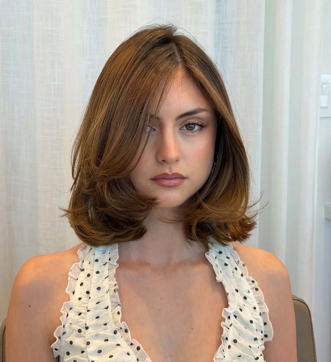 flattering november haircut ideas 2026 - Rounded Medium Bob With Swept Layers