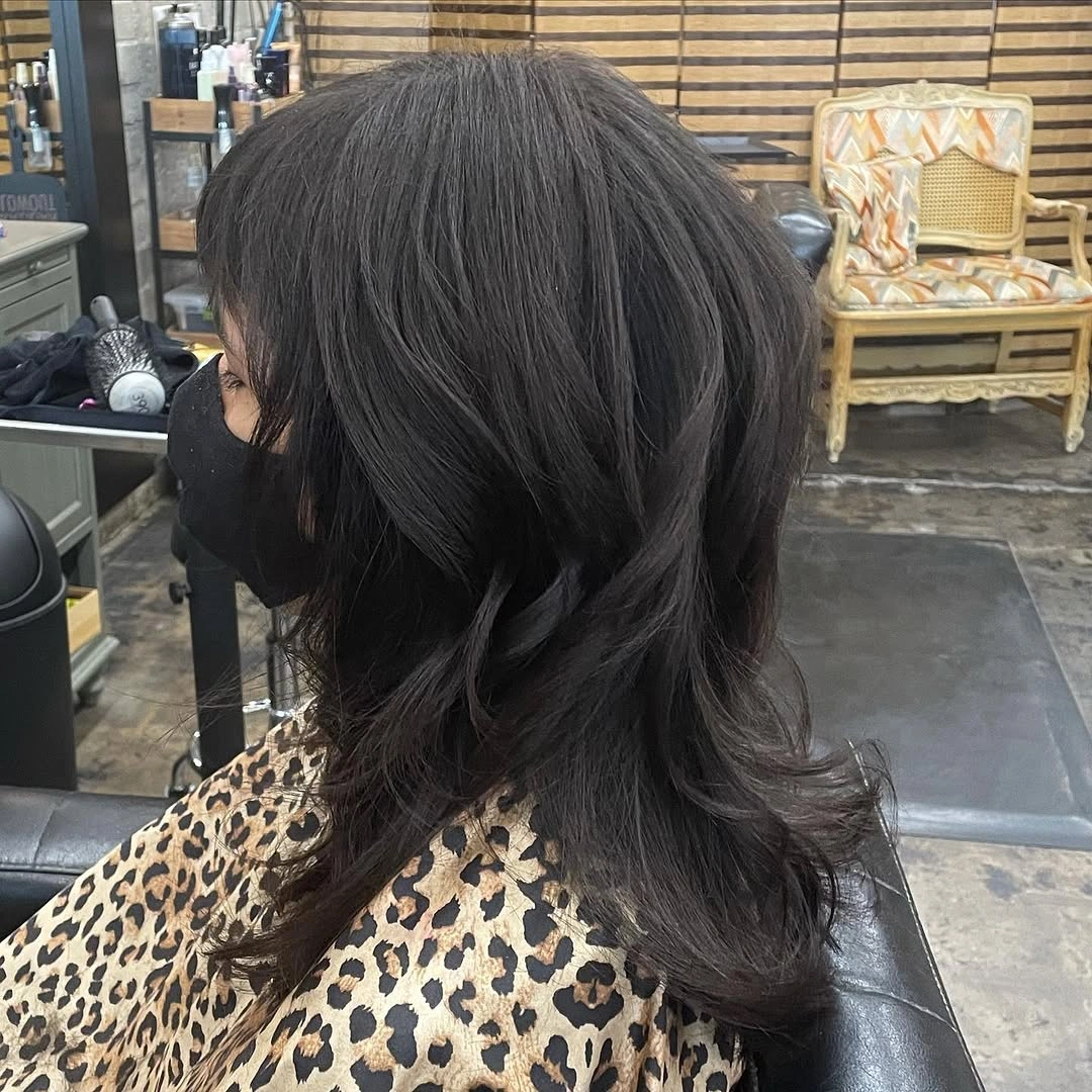 flattering winter haircuts for plus size women - Dark Layered Shag With a Cool Rock-and-Roll Mood