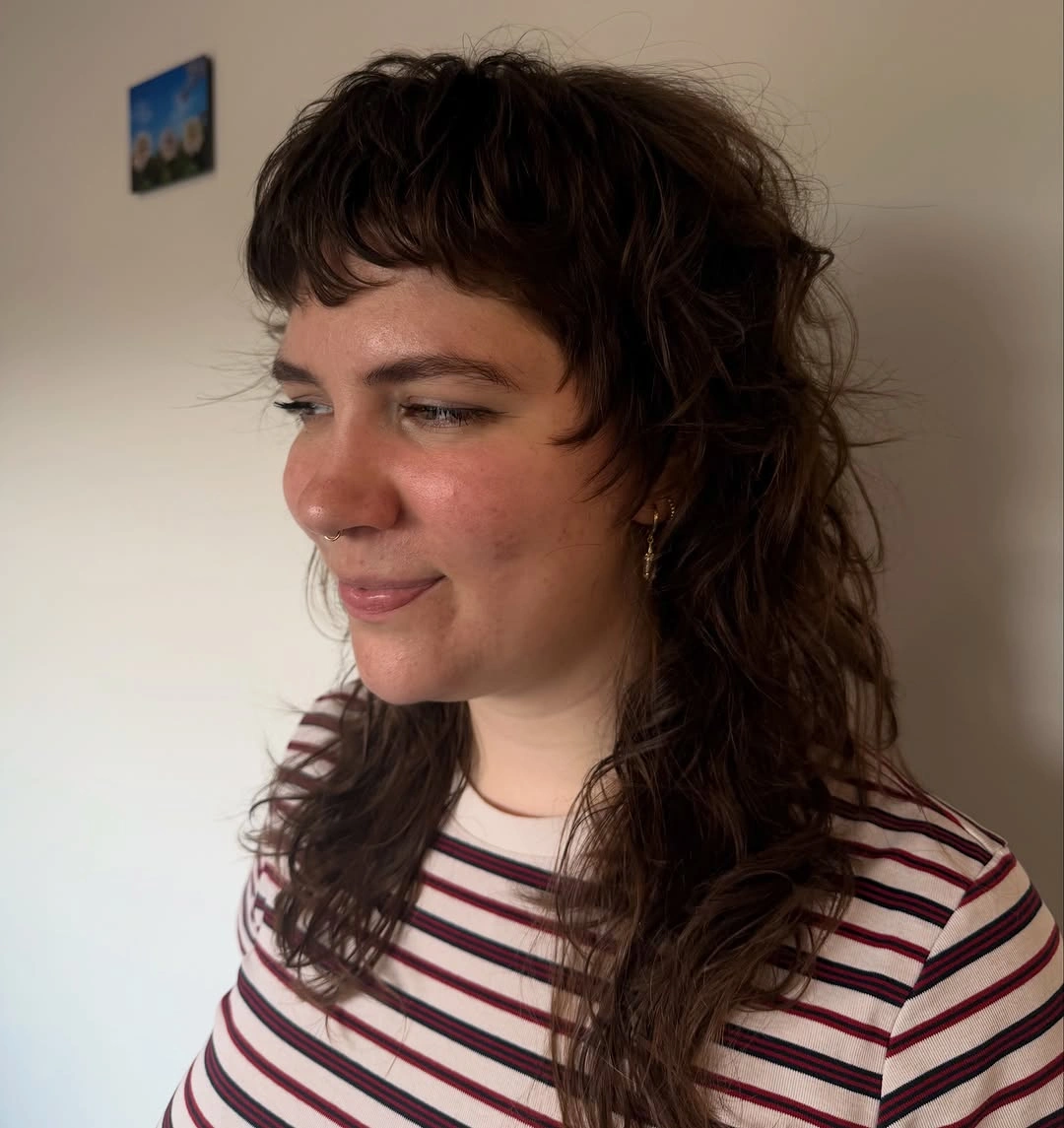 flattering winter haircuts for plus size women - Long Curly Shag With Soft Micro Bangs