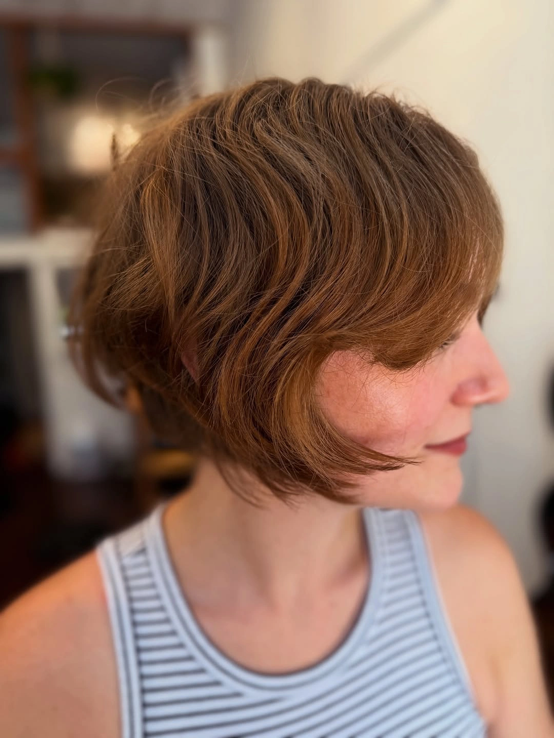flattering winter haircuts for plus size women - Warm Brown Rounded Bob