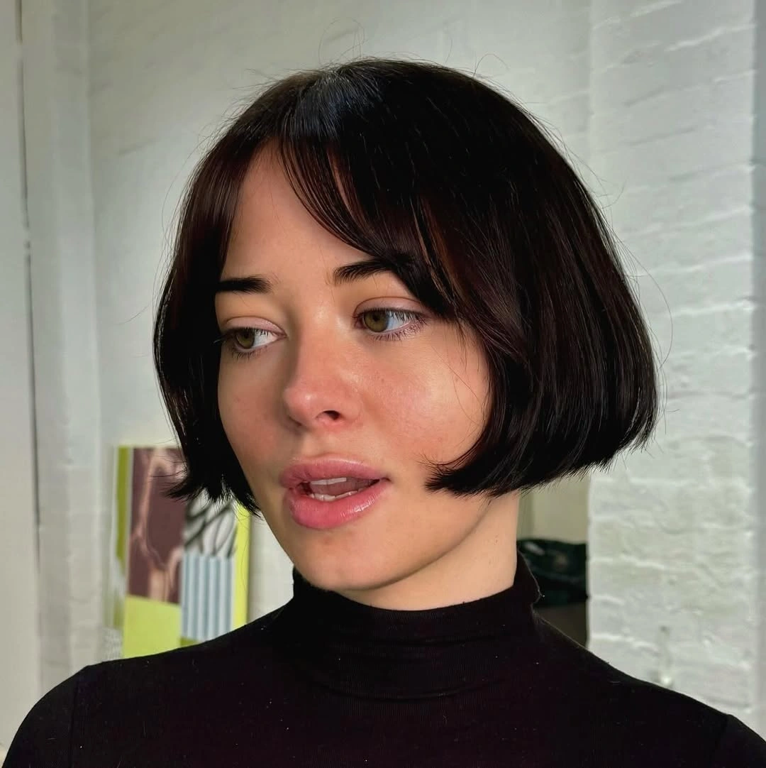 french bob cut Glossy Black Bob With Curved Fringe