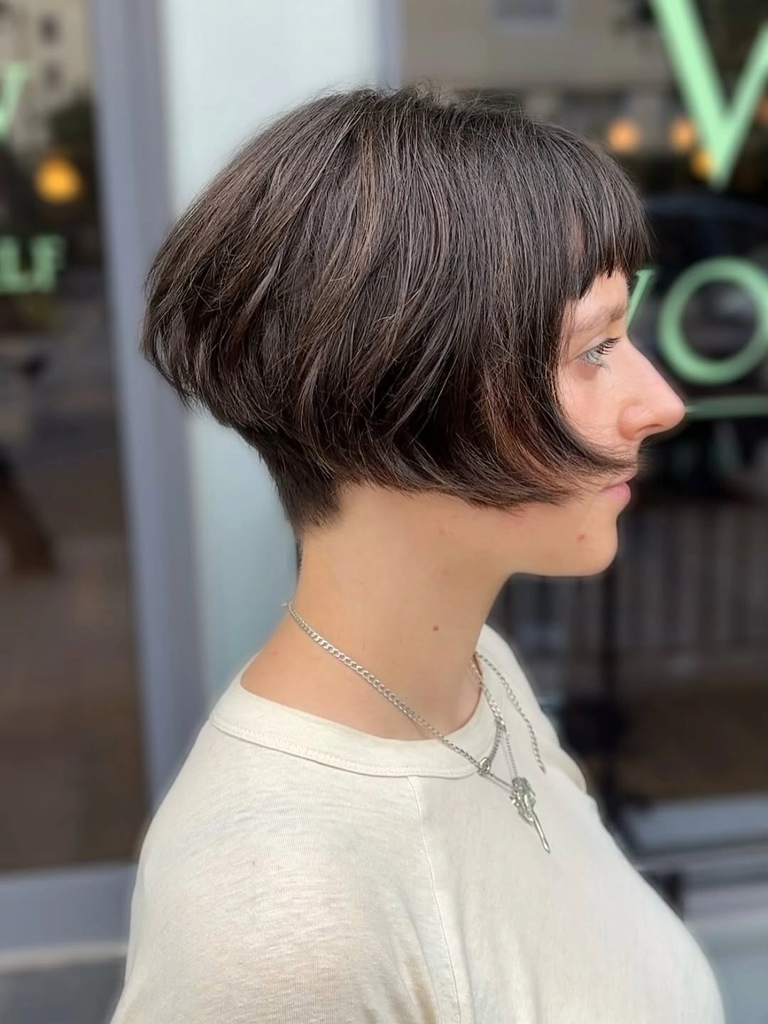 french bob cut Rounded Brunette Bob With Wispy Fringe