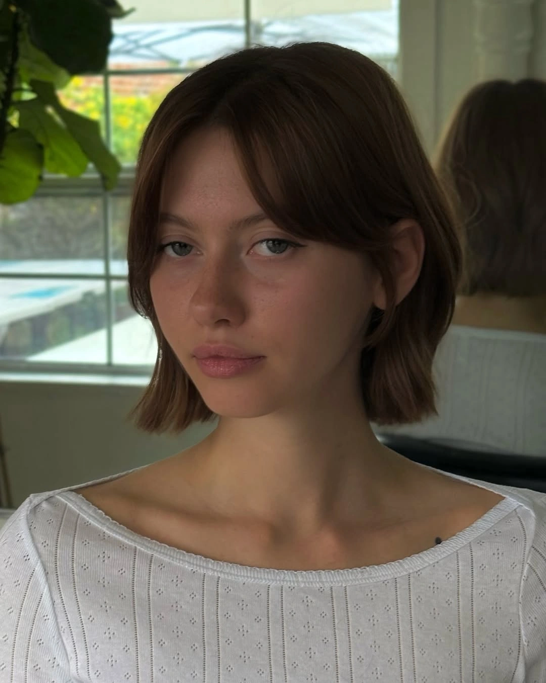 french bob cut Chin Length Bob With Curtain Bangs