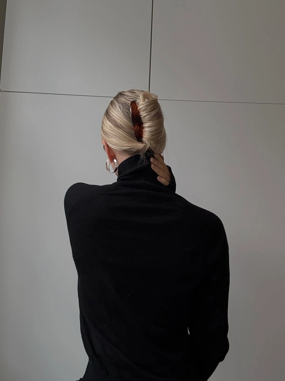 glamorous christmas hairstyles 2026 - Elegant French Twist With a Tortoiseshell Clip