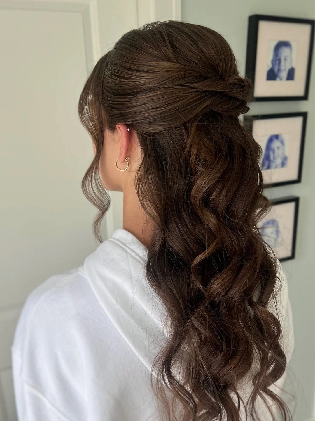 glamorous christmas hairstyles 2026 - Romantic brunette half-up waves