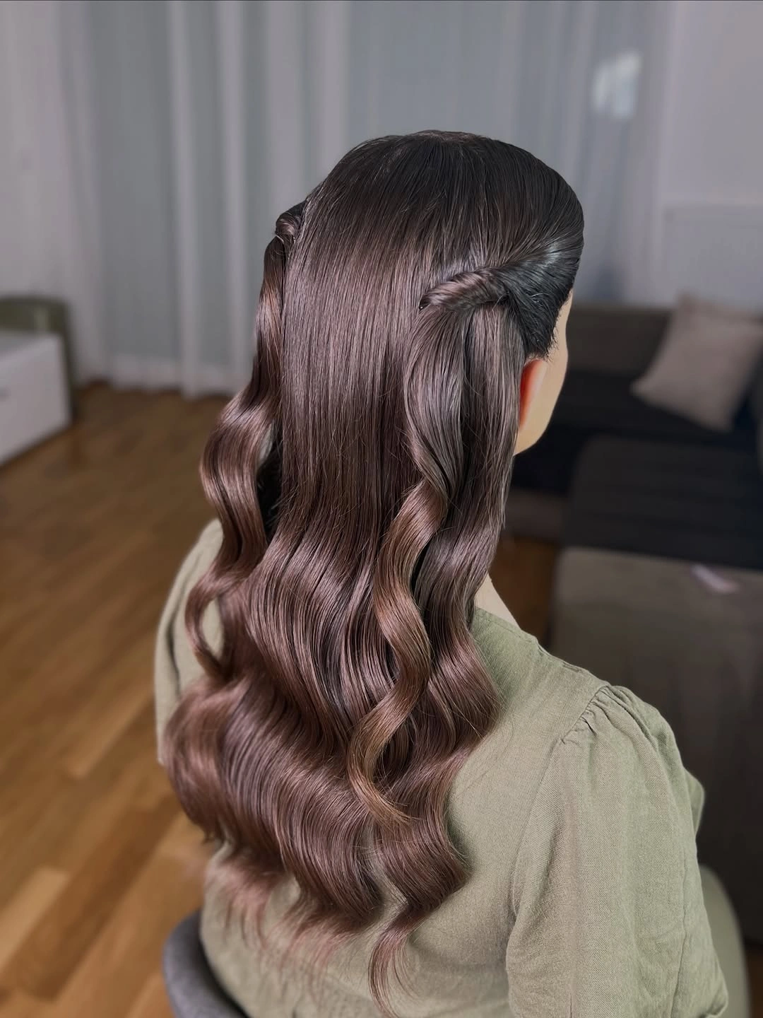 glamorous christmas hairstyles 2026 - Brunette twisted half-up waves