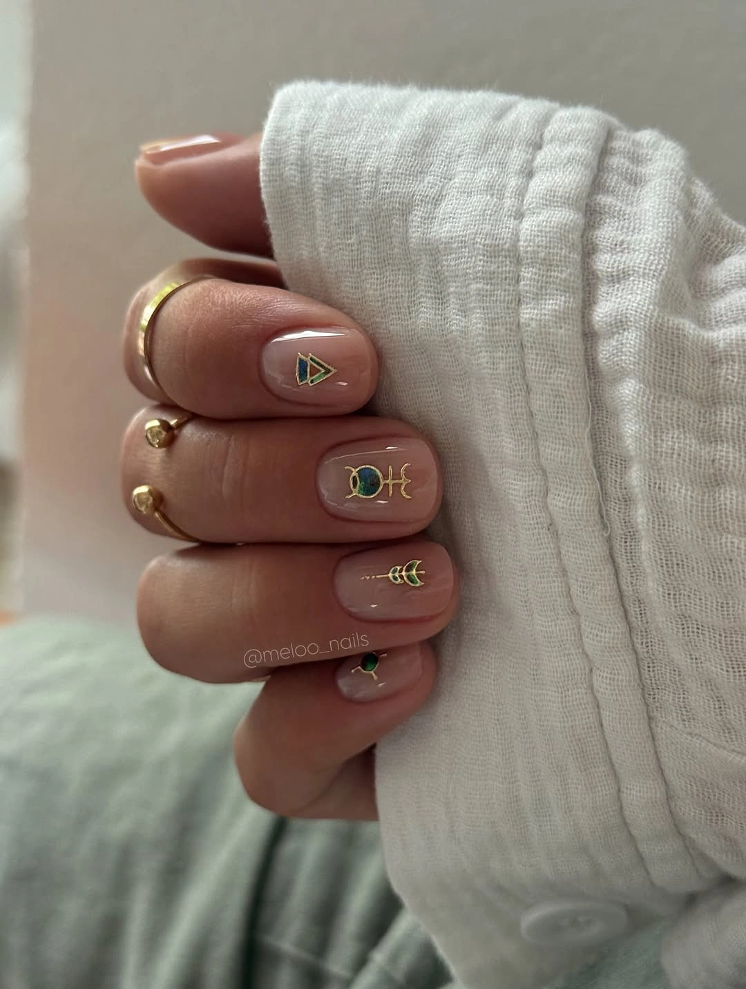 gorgeous short nails 2027 Minimal Nude With Gold Symbols