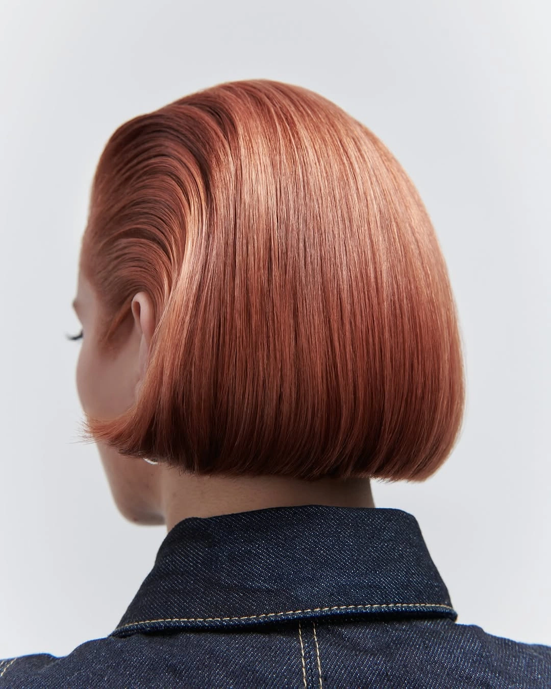 modern bobbed haircut Polished Copper Bob With a Clean Finish