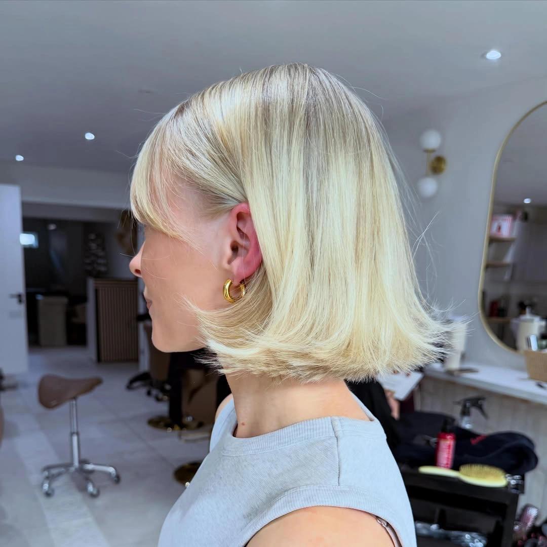 modern bobbed haircut Long Blonde Bob With Soft Flipped Ends