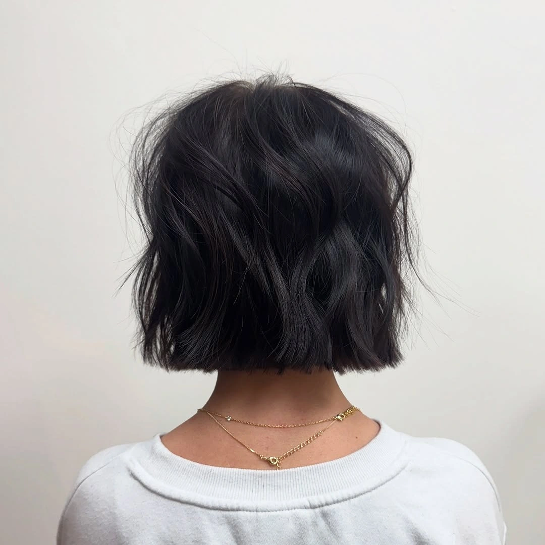 modern bobbed haircut Messy Black Bob With Airy Texture