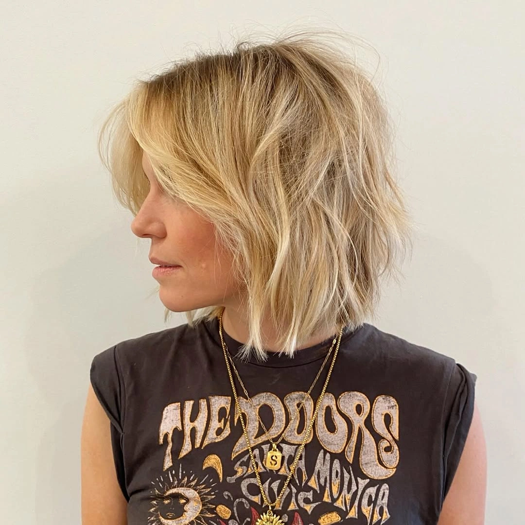 modern bobbed haircut Layered Blonde Bob With Rock Inspired Texture