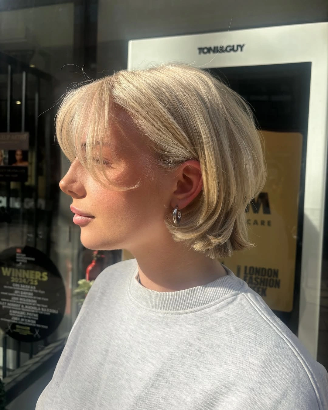 modern bobbed haircut Soft Blonde Bob With Curtain Fringe