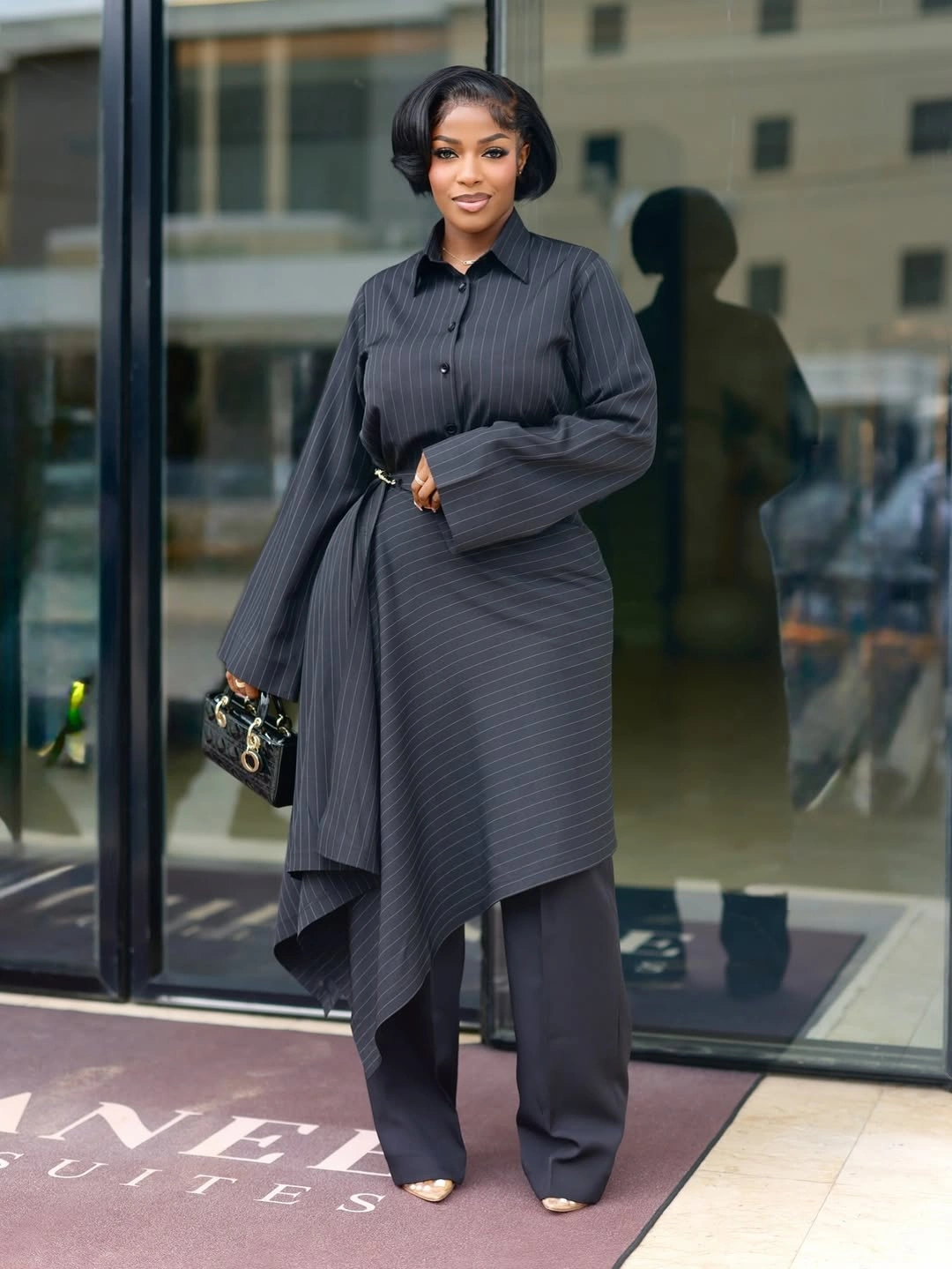 modern business casual dress code for women - Pinstripe Shirt Dress With a Dramatic Modern Shape