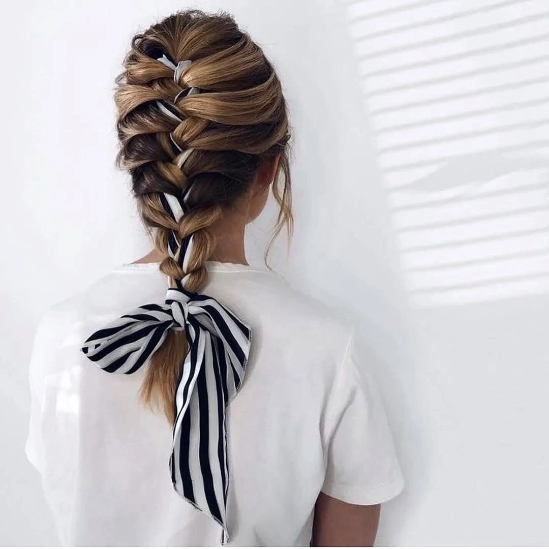 modern scarf hairstyle Statement Braid Finished With a Striped Scarf