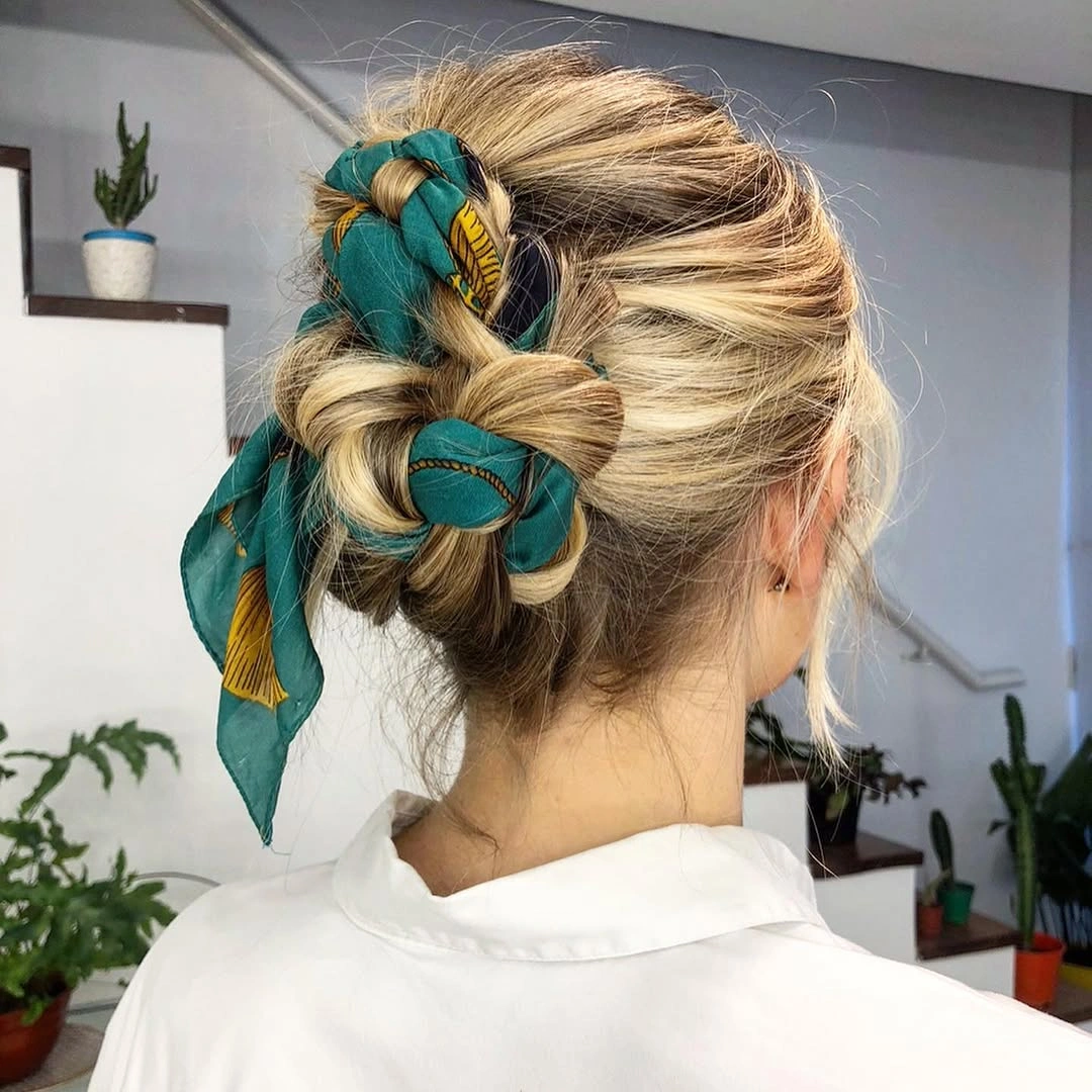modern scarf hairstyle Soft Scarf Bun With a Playful Finish