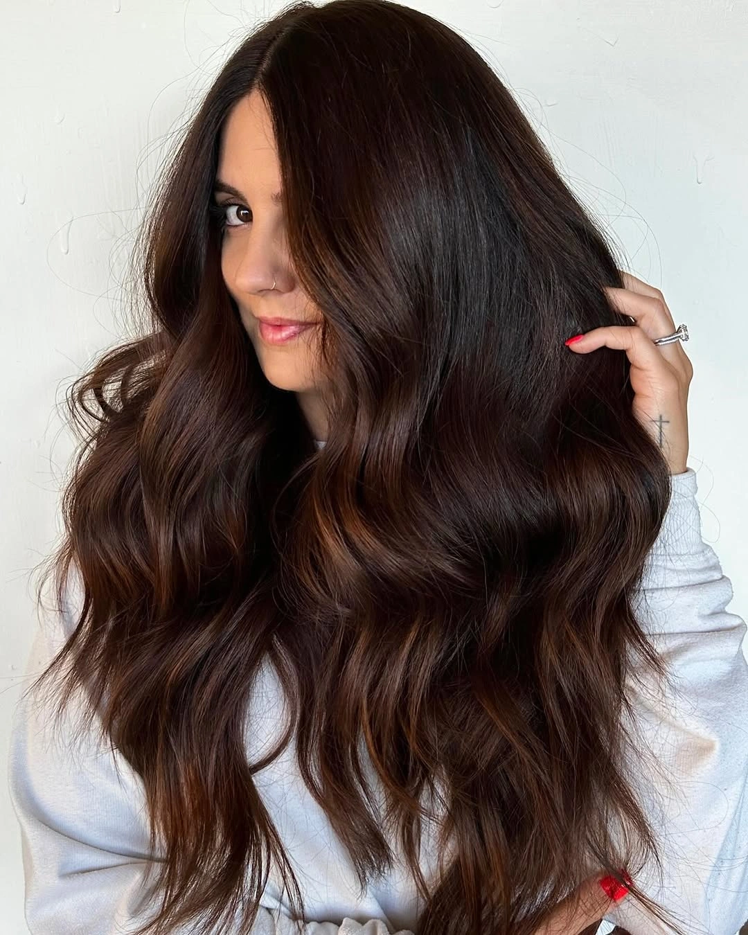 rich and cozy winter hair color ideas for brunettes Rich Chocolate Waves With Auburn Depth