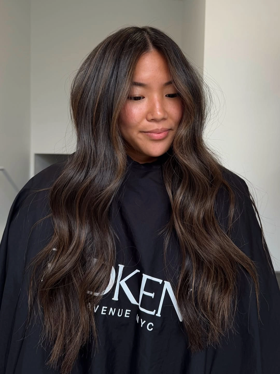 rich and cozy winter hair color ideas for brunettes Deep Brunette With Subtle Face Framing