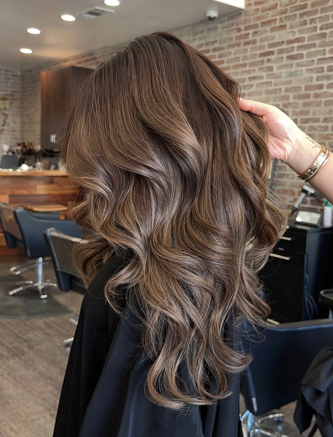 rich and cozy winter hair color ideas for brunettes Mocha Brown Balayage Waves