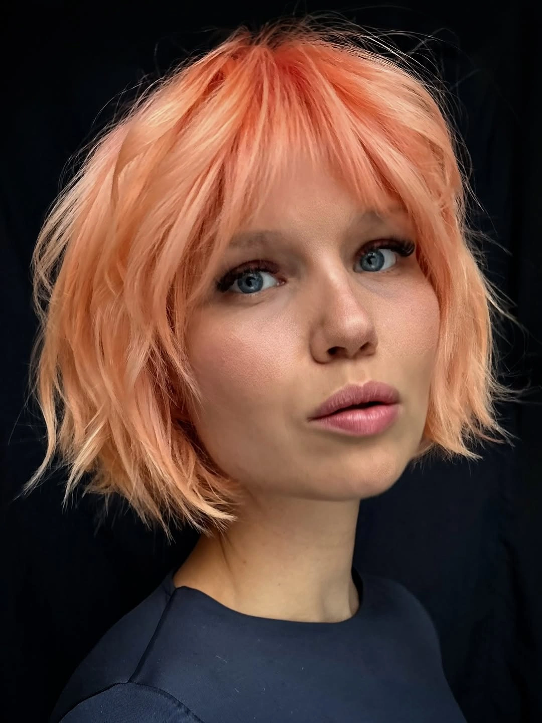 short bob hairstyle Peachy Bob With Wispy Bangs