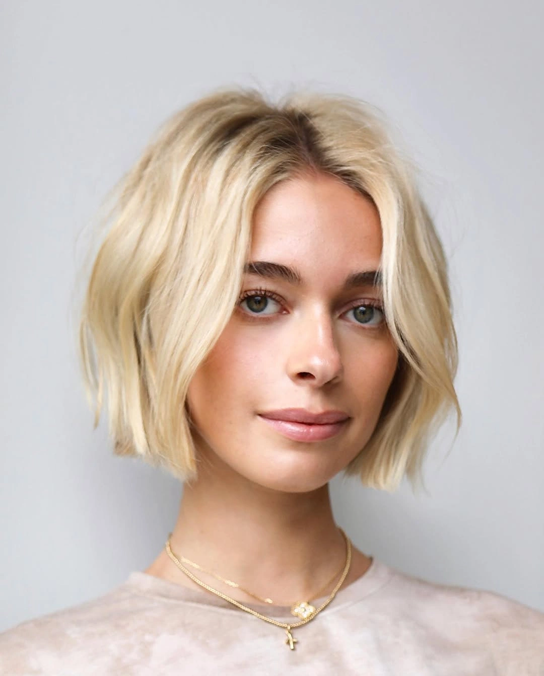 short bob hairstyle Soft Wavy Blonde Bob With a Relaxed Center Part