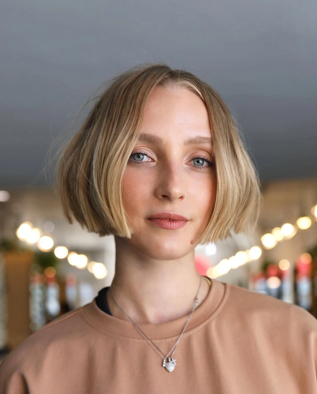 short bob hairstyle Soft Blonde Bob With a Center Part