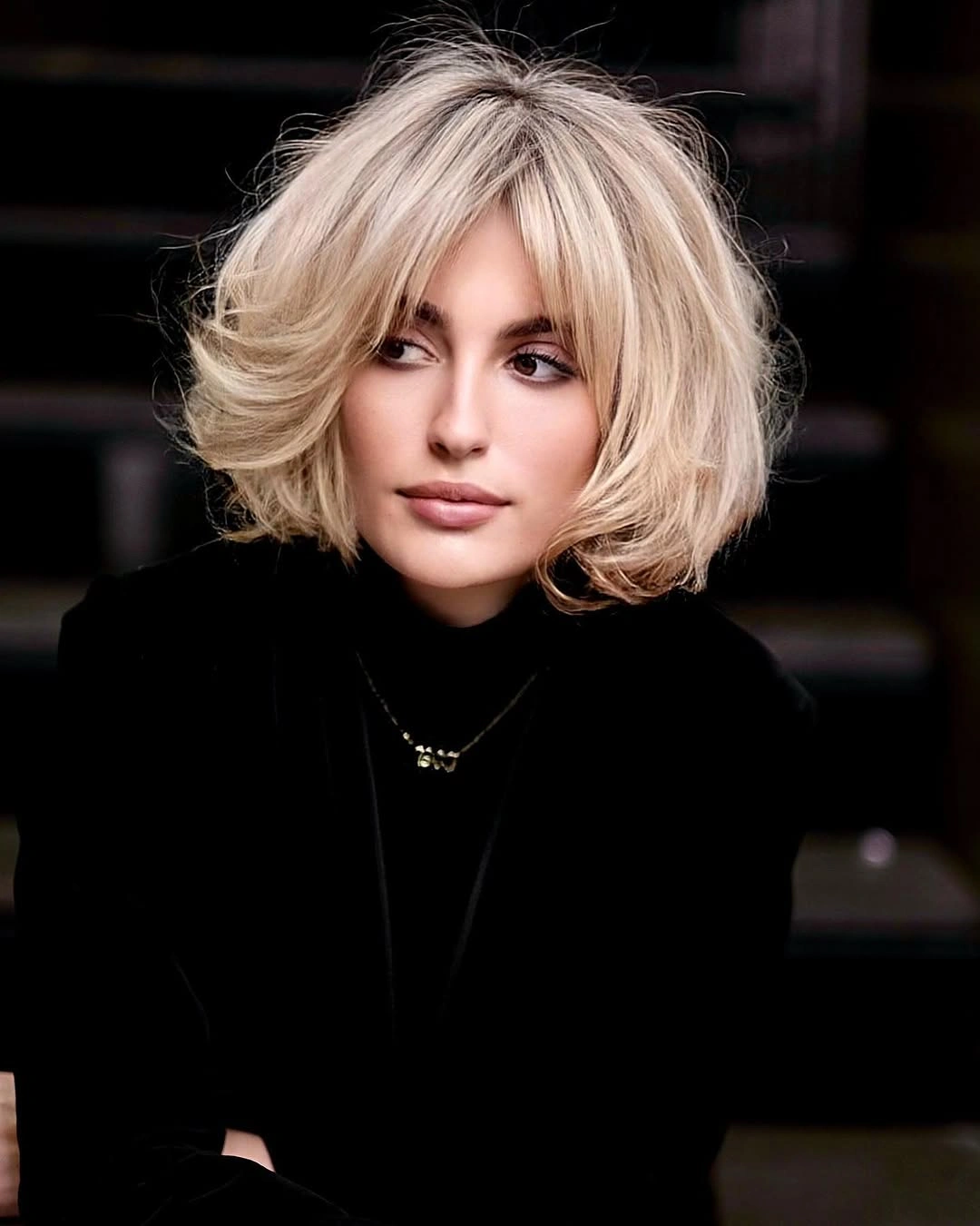 short bob hairstyle Voluminous Blonde Bob With Curtain Fringe