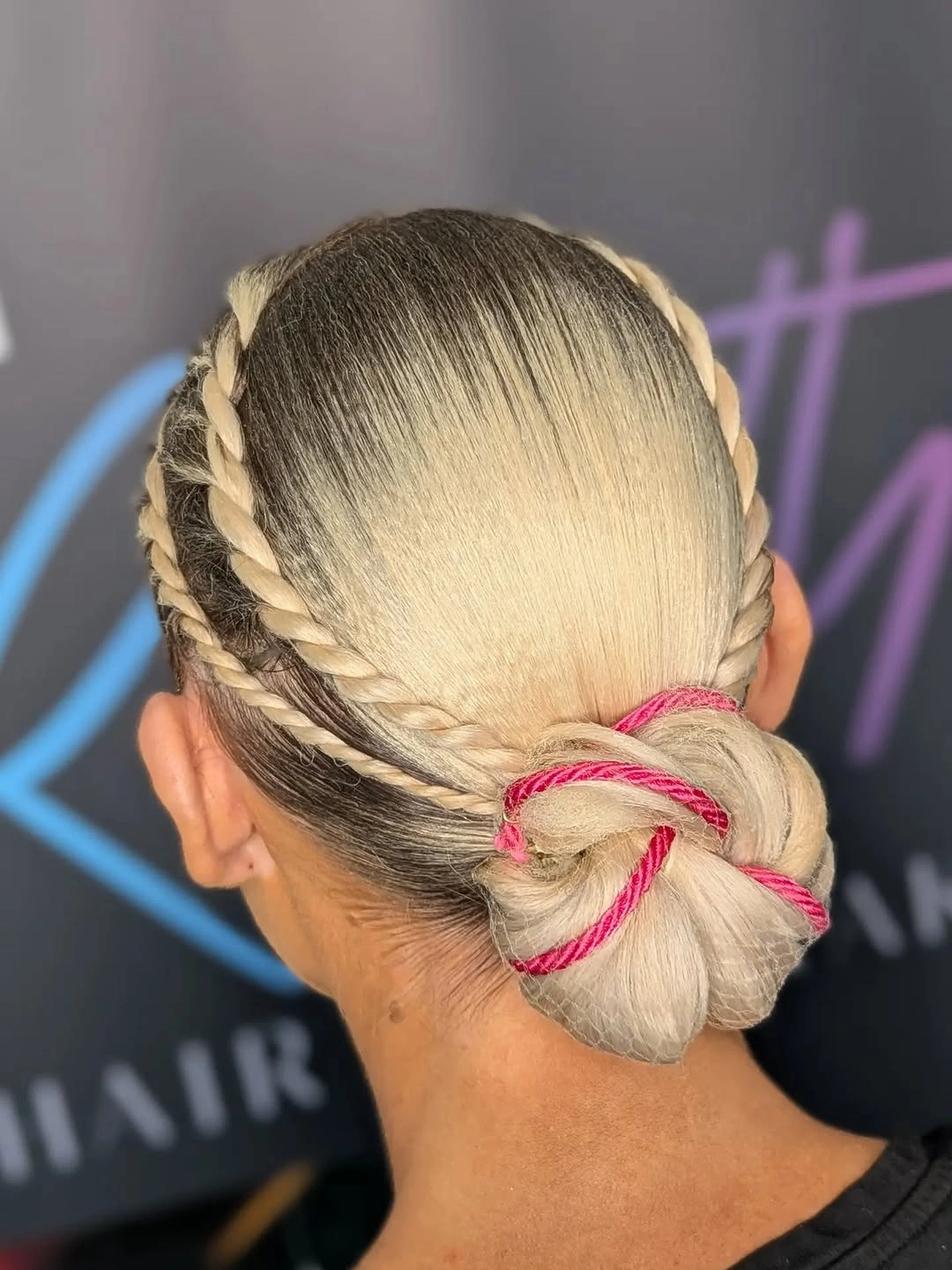 sstylish sports hairstyle Double Braids With a Soft Low Bun