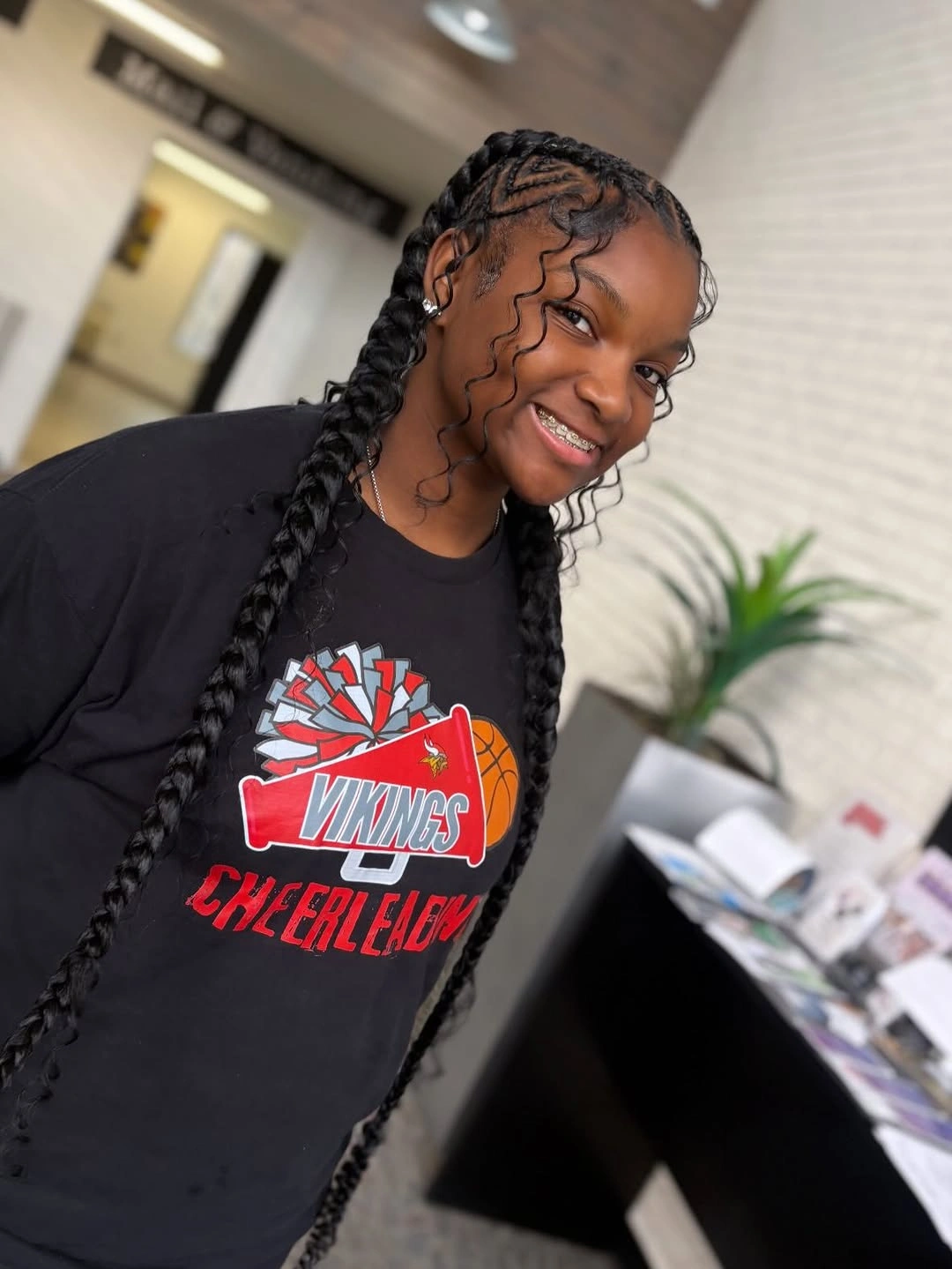 sstylish sports hairstyle Long Braids With Defined Curls