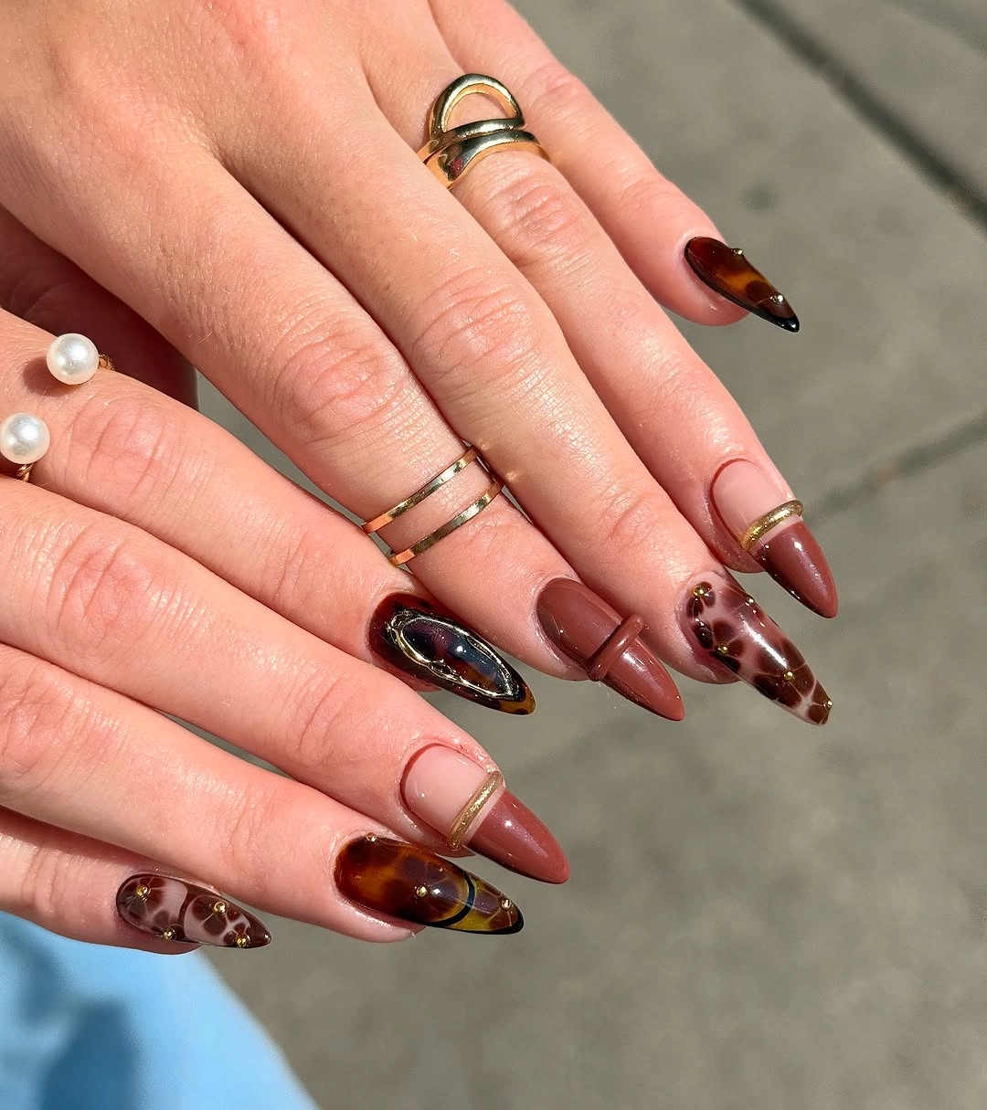 stunning november nails colors 2026 Tortoiseshell Mocha Almond Nails with Gold Details