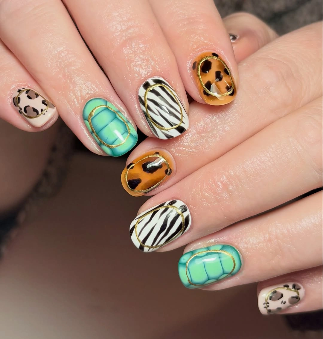 stunning november nails colors 2026 Playful Animal Print and Turquoise Nails