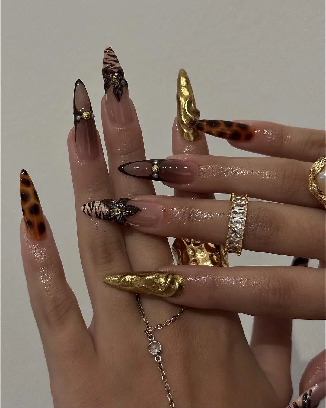stunning november nails colors 2026 Chocolate Tortoiseshell and Gold Statement Nails