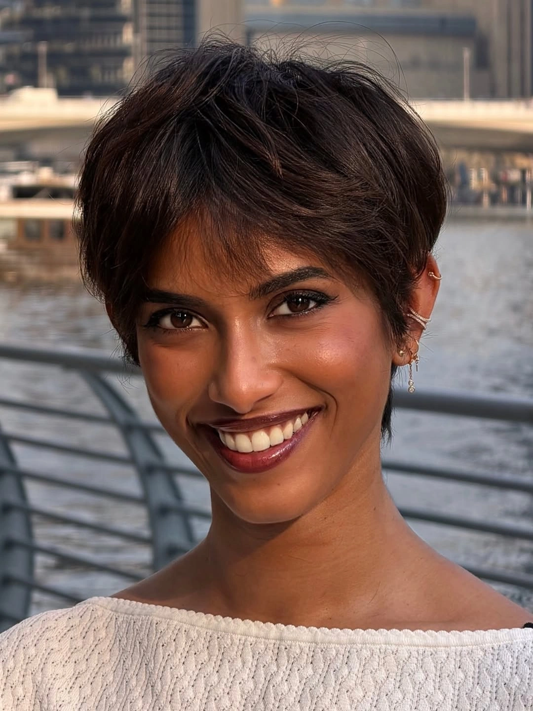 short haircut for women Short Feathered Pixie With Side Swept Bangs