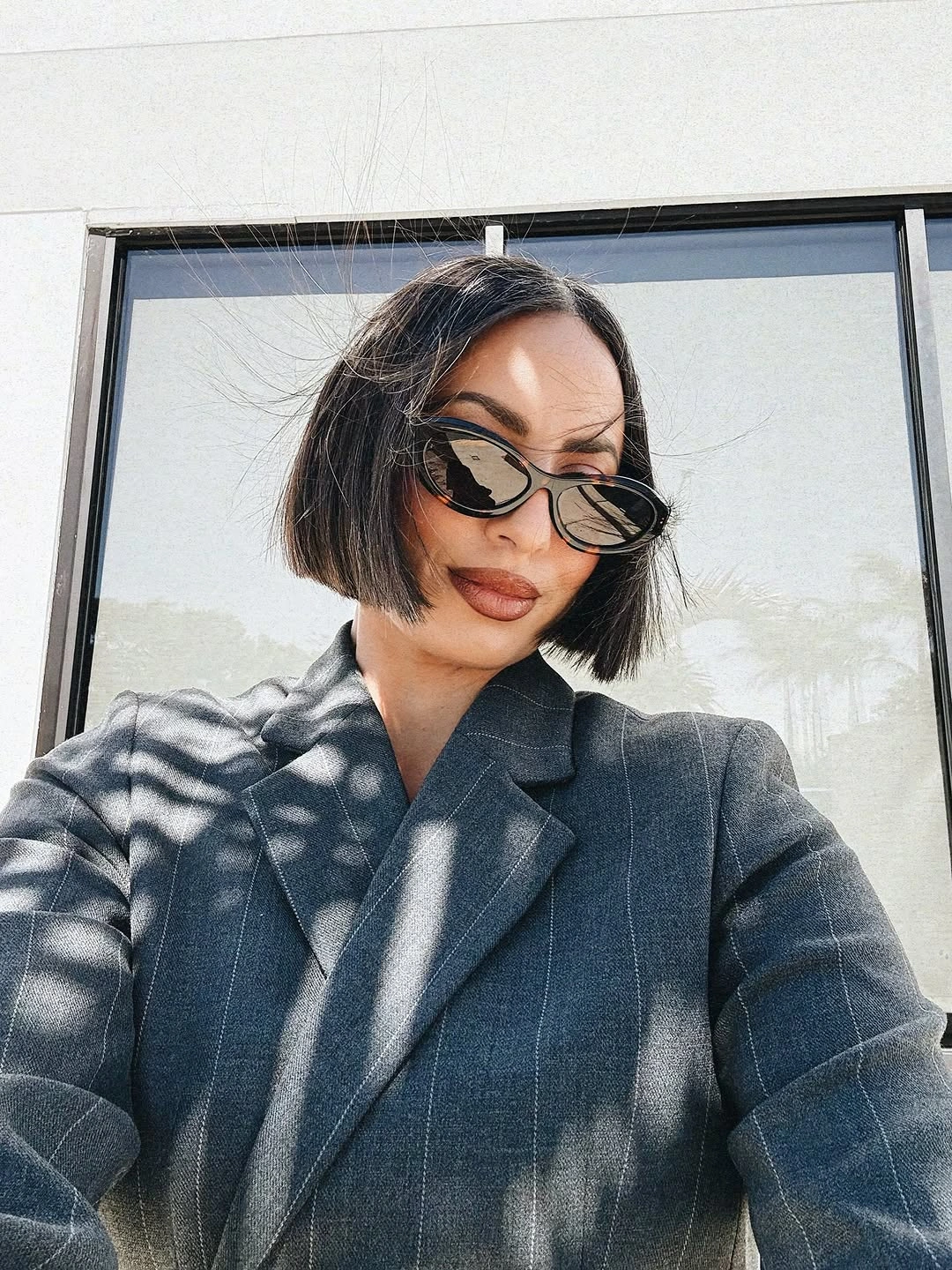 short haircut for women Polished Side Part Bob With Retro Volume