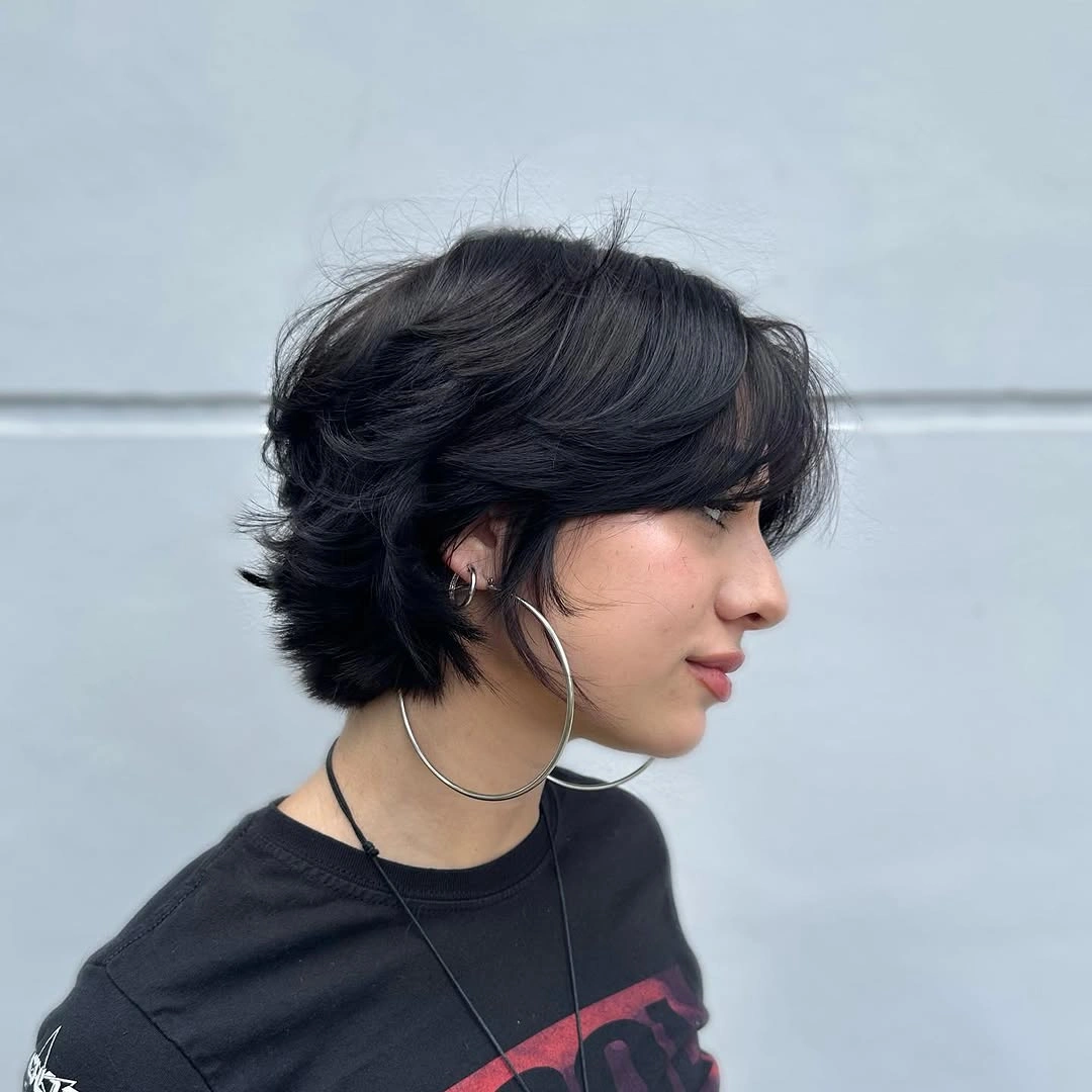 short haircut for women Layered Black Bixie With Feathered Movement