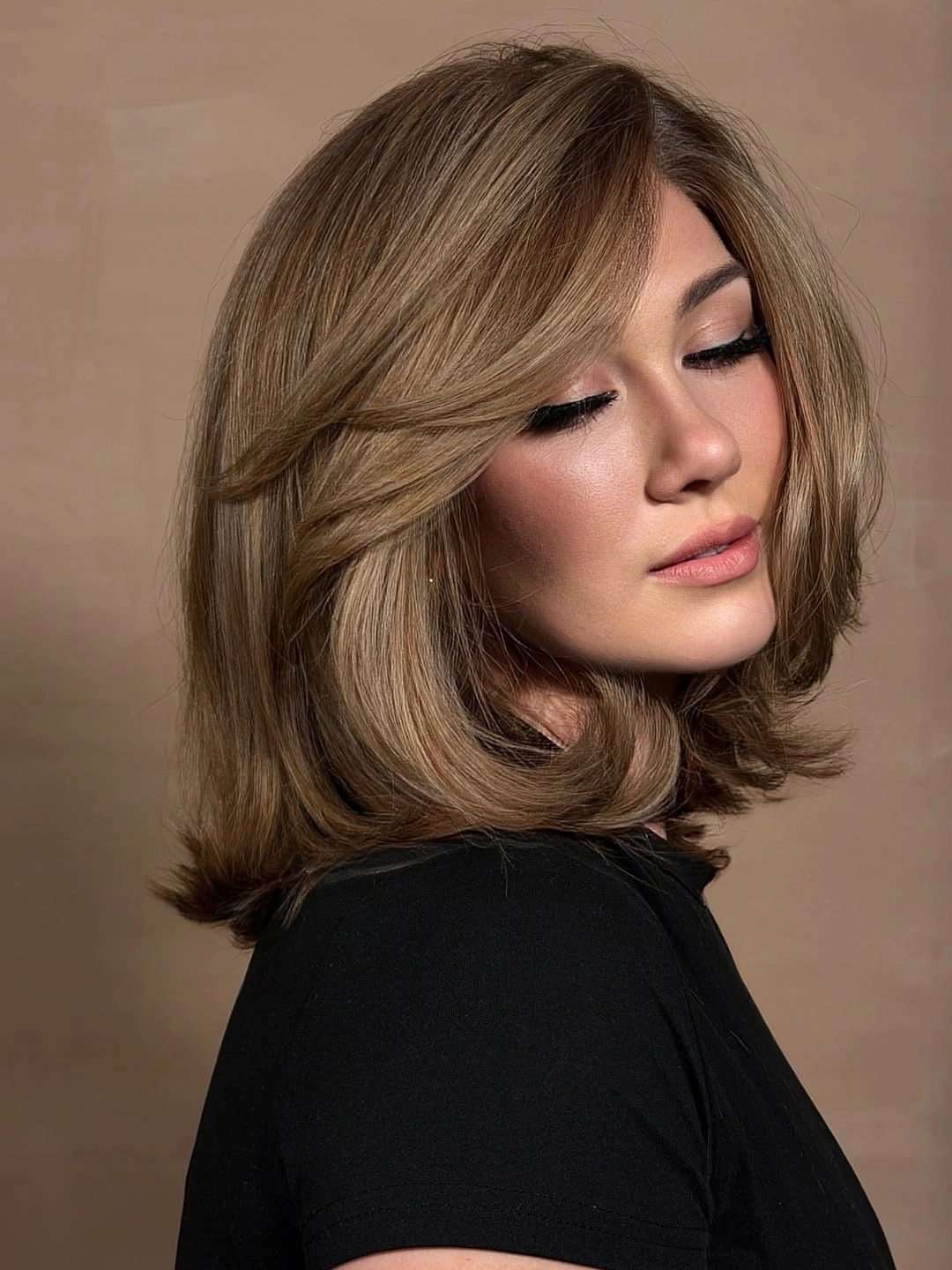 stylish and trendy hairstyles for women over 30 2027 Polished Mid-Length Layers With a Soft Side Sweep