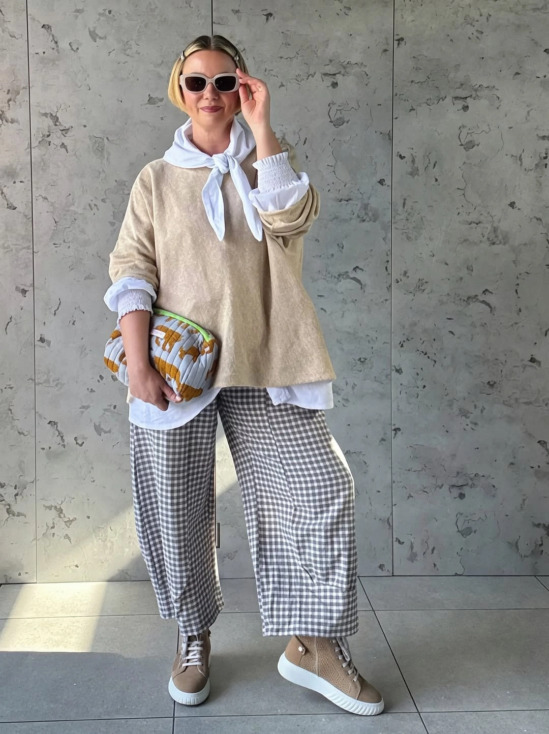 stylish and trendy outfits for women over 50 2027 - Soft Neutrals With a Playful Preppy Twist