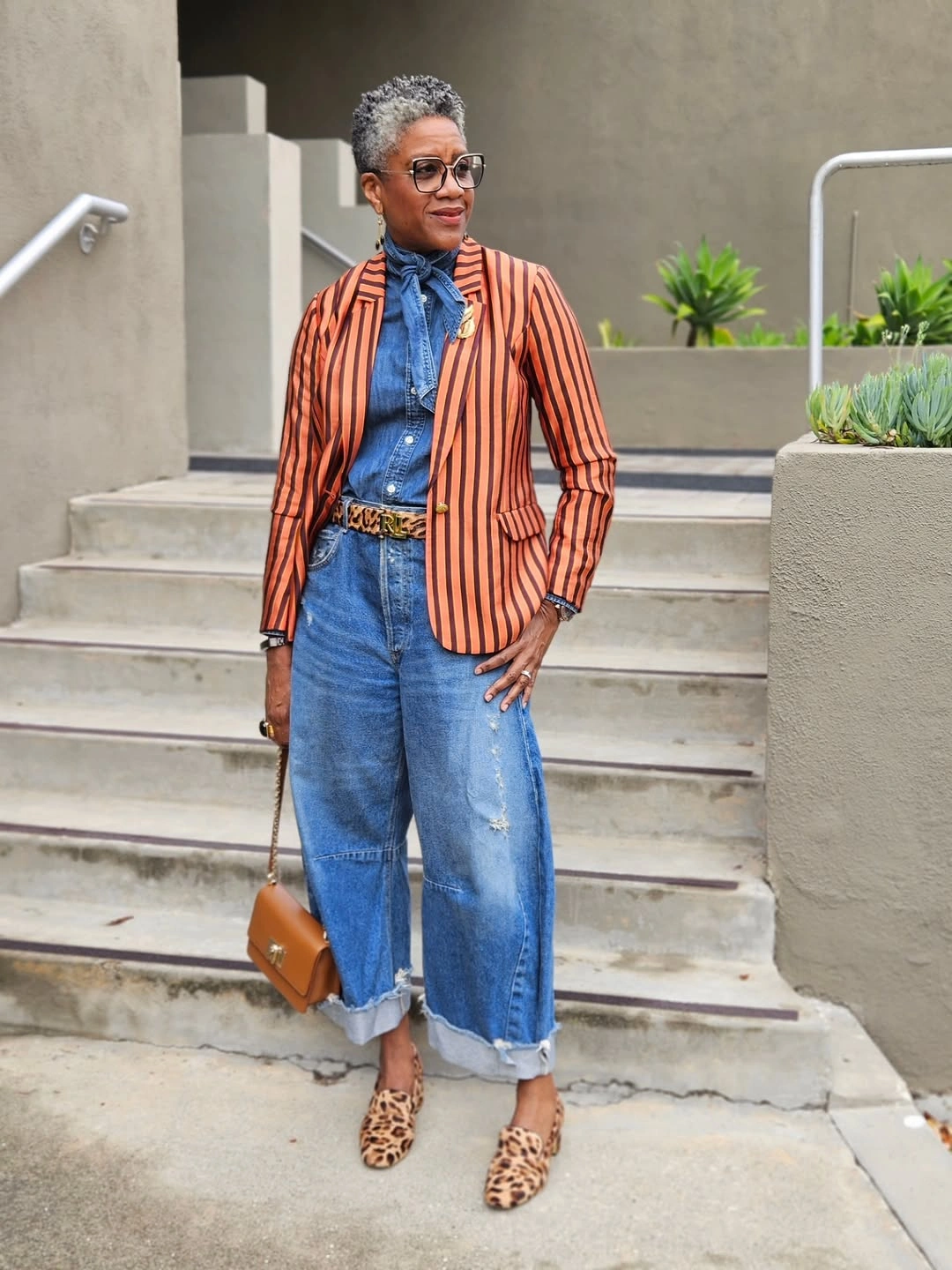 stylish and trendy outfits for women over 50 2027 - Striped Tailoring Meets Relaxed Denim