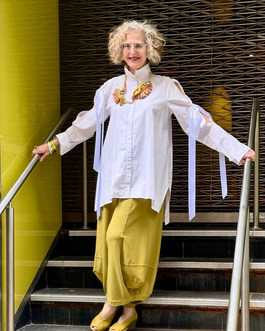 stylish and trendy outfits for women over 50 2027 - Artful White With Golden Yellow Accents