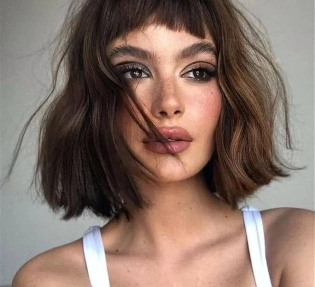 stylish bob with bangs Soft Brunette Bob With Airy Bangs