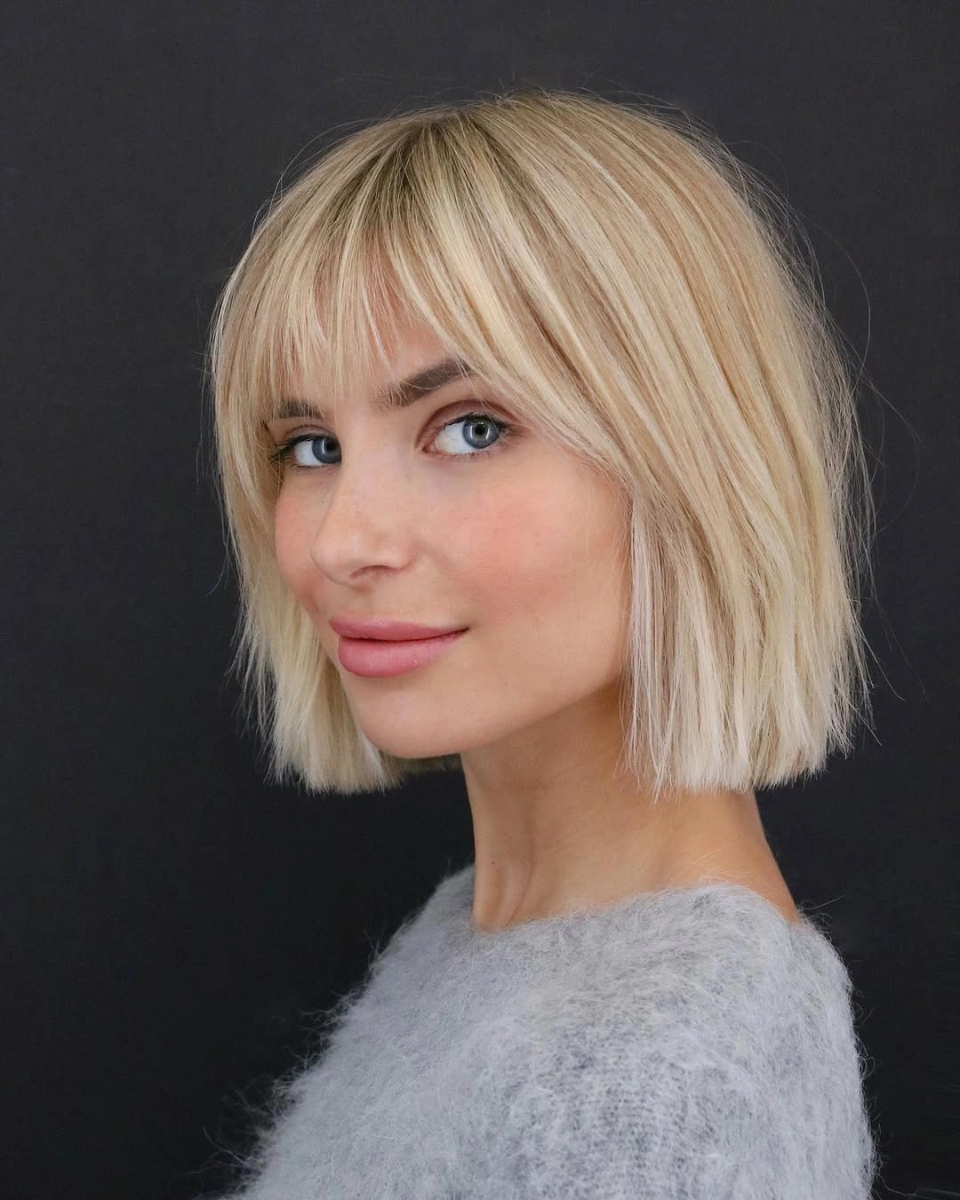 stylish bob with bangs Polished Blonde Bob With Soft Bangs
