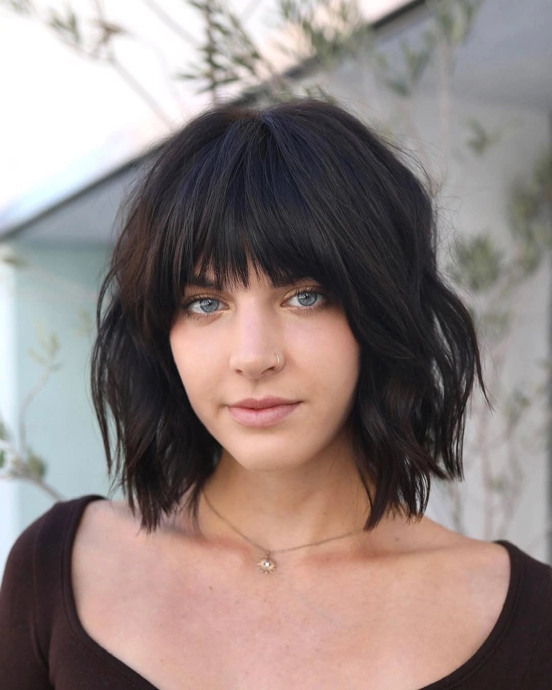stylish bob with bangs Shaggy Black Bob With Choppy Bangs