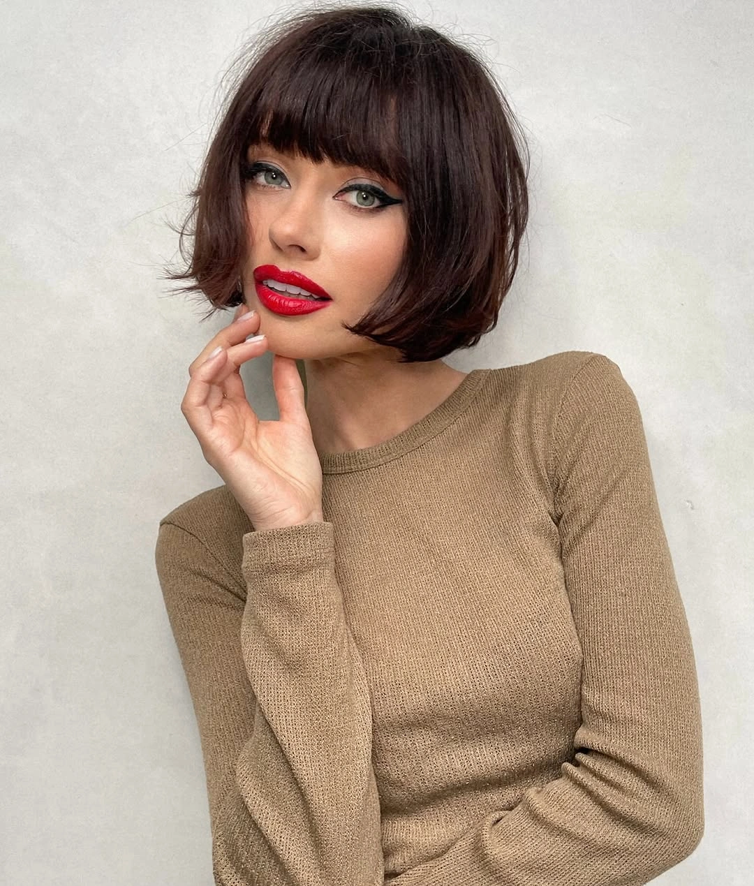 stylish bob with bangs Brunette French Bob With Full Fringe