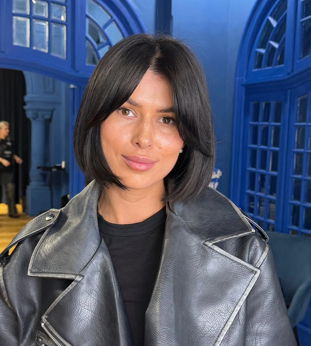 stylish bob with bangs Glossy Black Bob With Side Swept Bangs