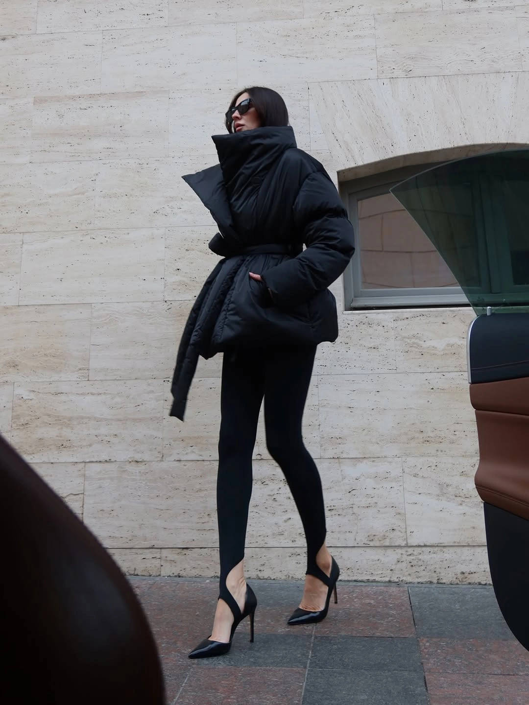 stylish & trendy puffer jackets 2027 Black Belted Puffer Meets Sharp Evening Shoes
