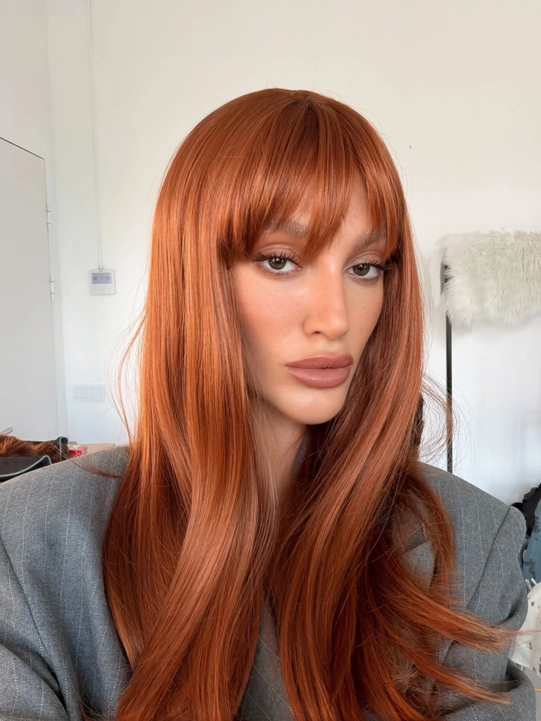 stylish winter haircuts Glossy Copper Length With Full Rounded Bangs