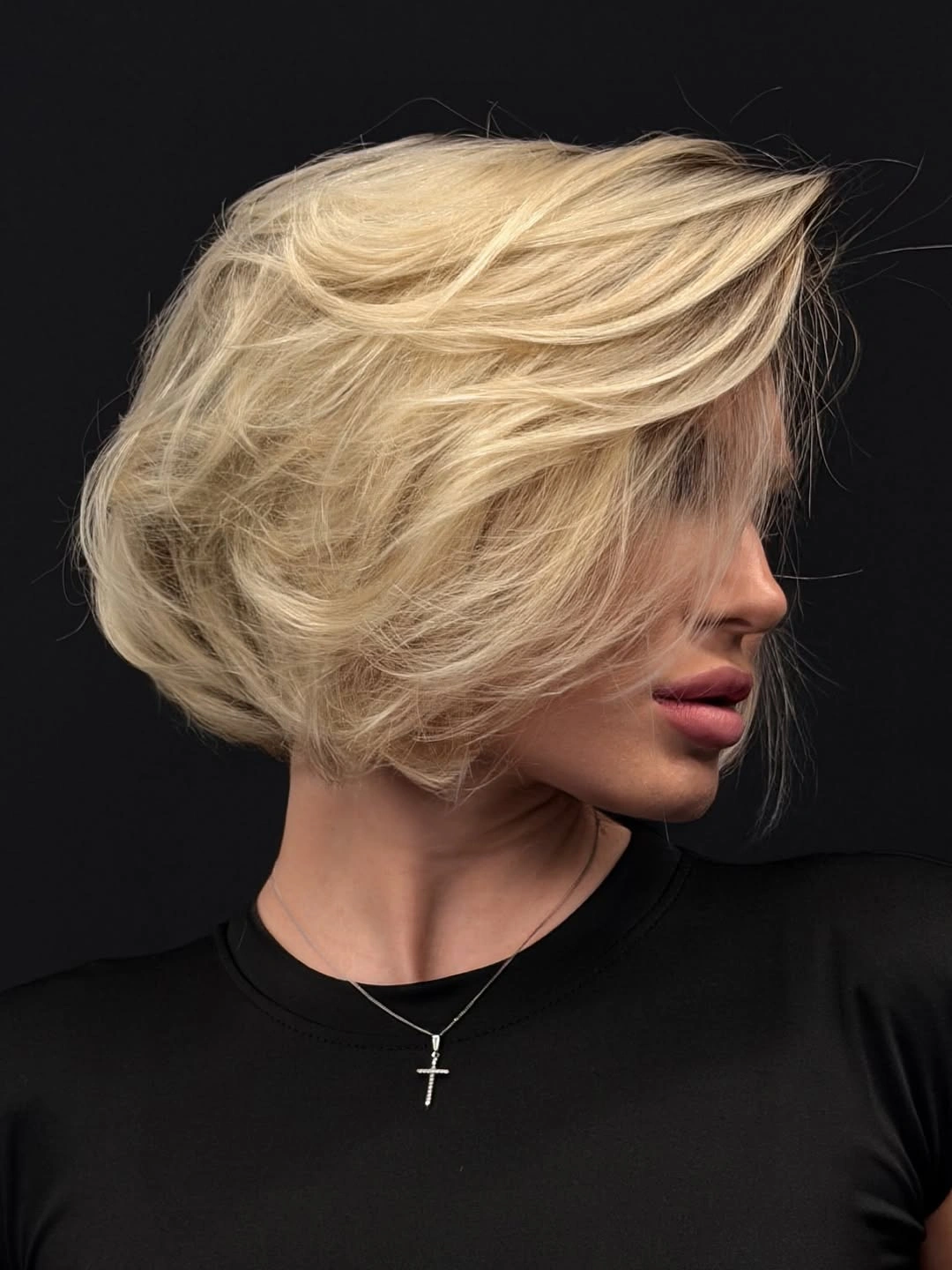 stylish winter haircuts Soft Blonde Bixie With Airy Side-Swept Layers