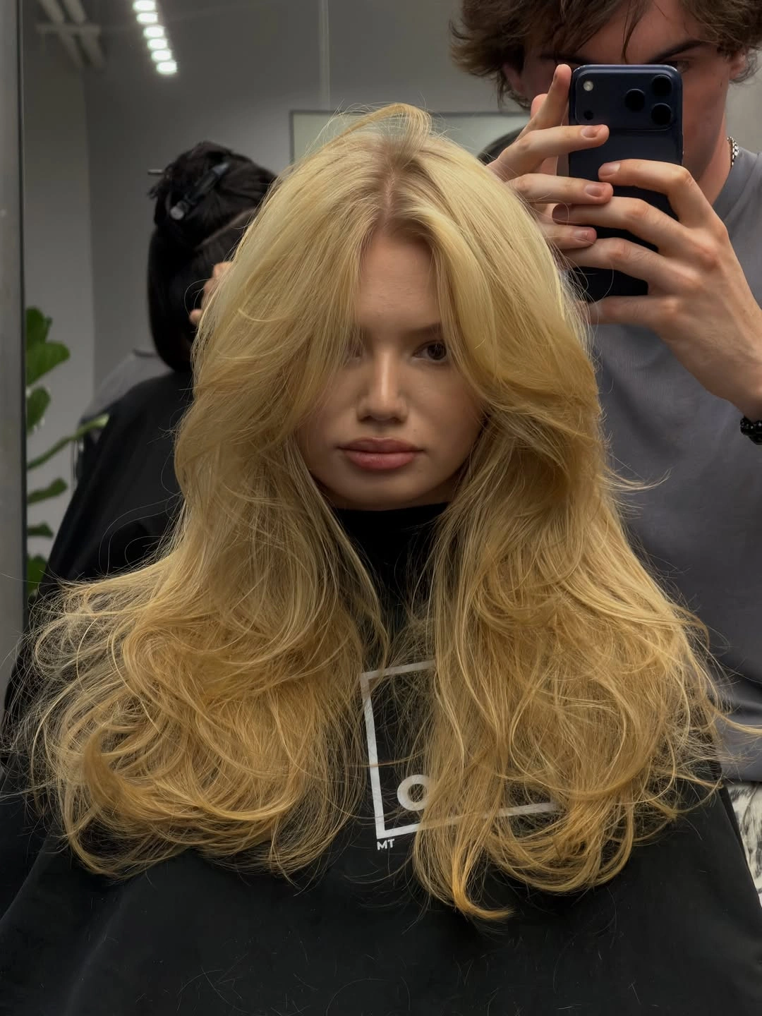 stylish winter haircuts Golden Blonde Waves With Dramatic Volume
