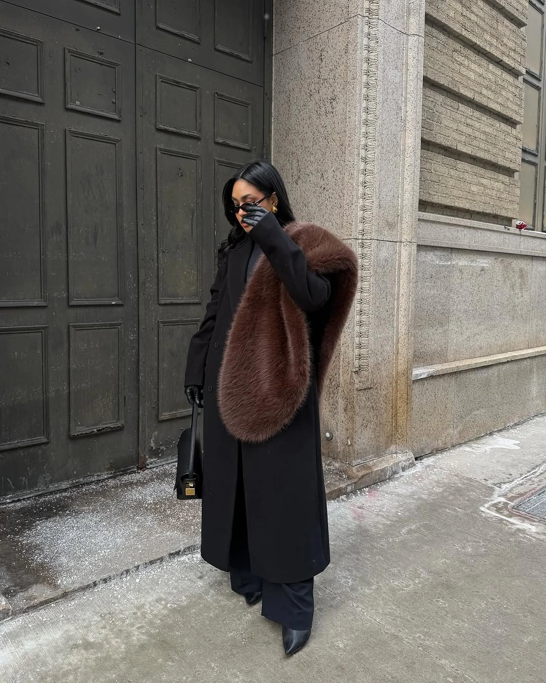 stylish winter NYC outfits - Black Tailoring With a Statement Fur Texture
