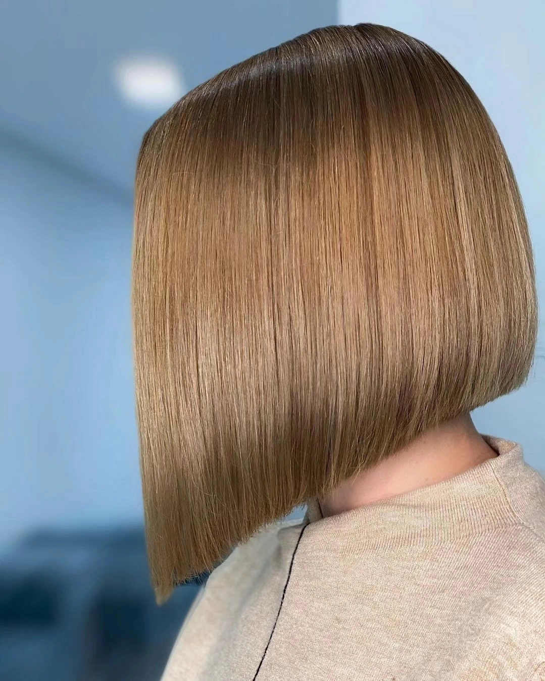 trendy a-line bob haircuts Warm Caramel A-Line Bob With A Sharp Angle